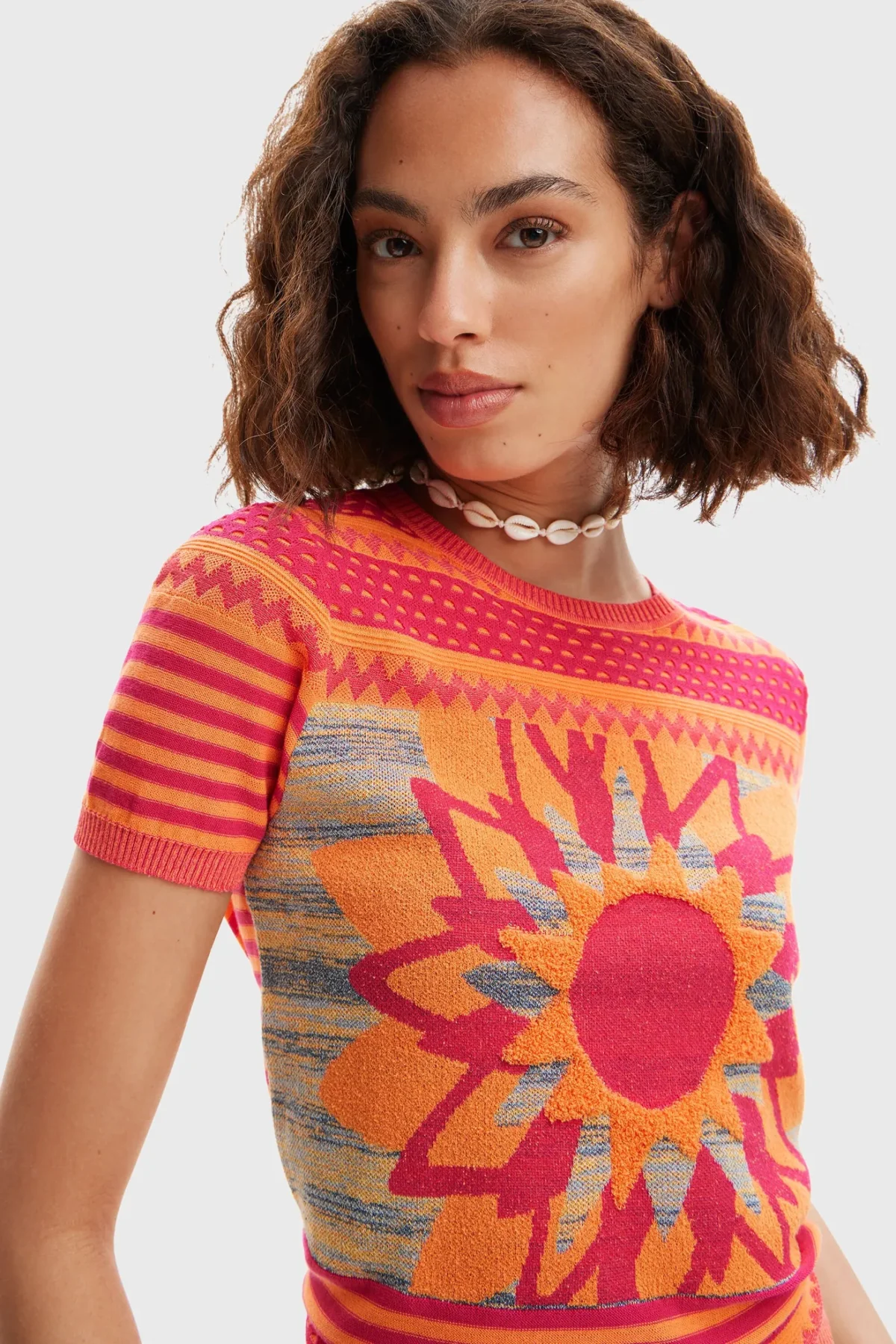 Camiseta flor naranja